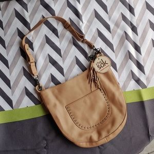 The Sak Genuine Leather.